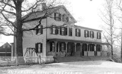In 1906 L.T. Current purchased the Depot House at Muskrat near the D.L. & W. Station and renamed it the Anthracite Hotel.  In 1912 he added on a sizeable addition and moved the bar up to the first floor.  In 1925, after prohibition had spoiled business, Mr. Current sold the business to William Kohler, who then sold it to Edward Hann.  After the trains stopped running, Mr. Hann continued to operate the tavern with rousing cockfights.  After his death, the tavern was left to his niece, Luella ONeil who then sold it to Bernie Wallace.  Not only named after the new owner and the road it sits on, the tavern is now called Bernies Hillside.