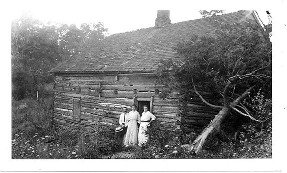 Hendrick (Henry) Wyckoff brought his family from Readington, NJ in 1798, to Black River, later known as Chester.  Many generations of the Wyckoff family lived in this log home and farmed the land and descendents of the family are still in Chester today.  Originally this log home belonged to minuteman John Emmons who had owned and farmed many acres in this area south of Chester near the intersection of Lamerson Road and Route 206.  Pictured in front of the cabin are members of the Howell family who were friends visiting.  All that is left on this site are foundations and this spring.  It has been noted in a letter in the Washingtons Headquarter Museum Library in Morristown, NJ that Washington himself had stayed in a log house one mile south of Chester.  It is believed to have been this log cabin.